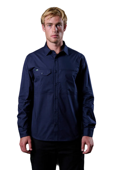 Man wearing a navy blue shirt against a black background